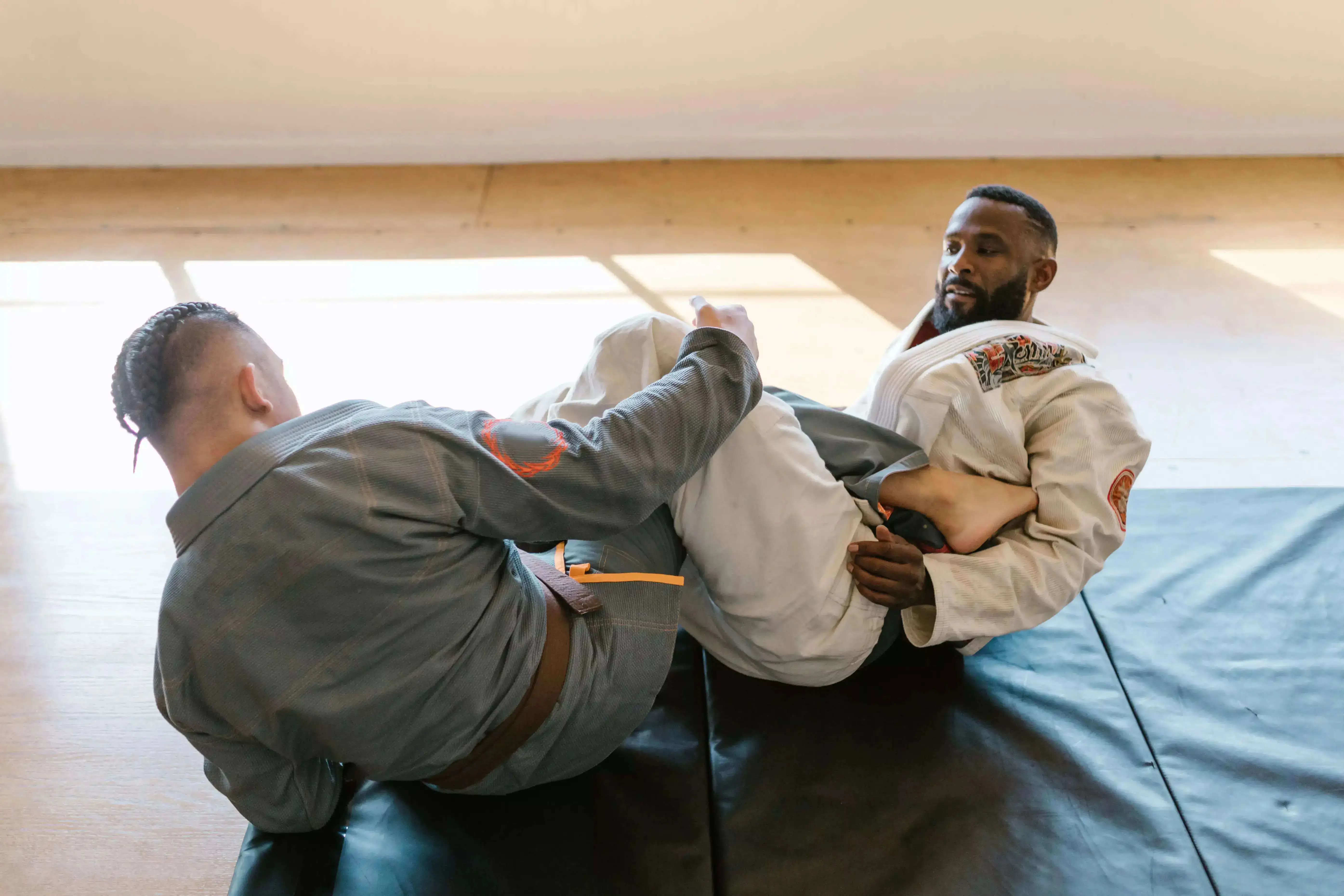 Two men competing in a jiu-jitsu match