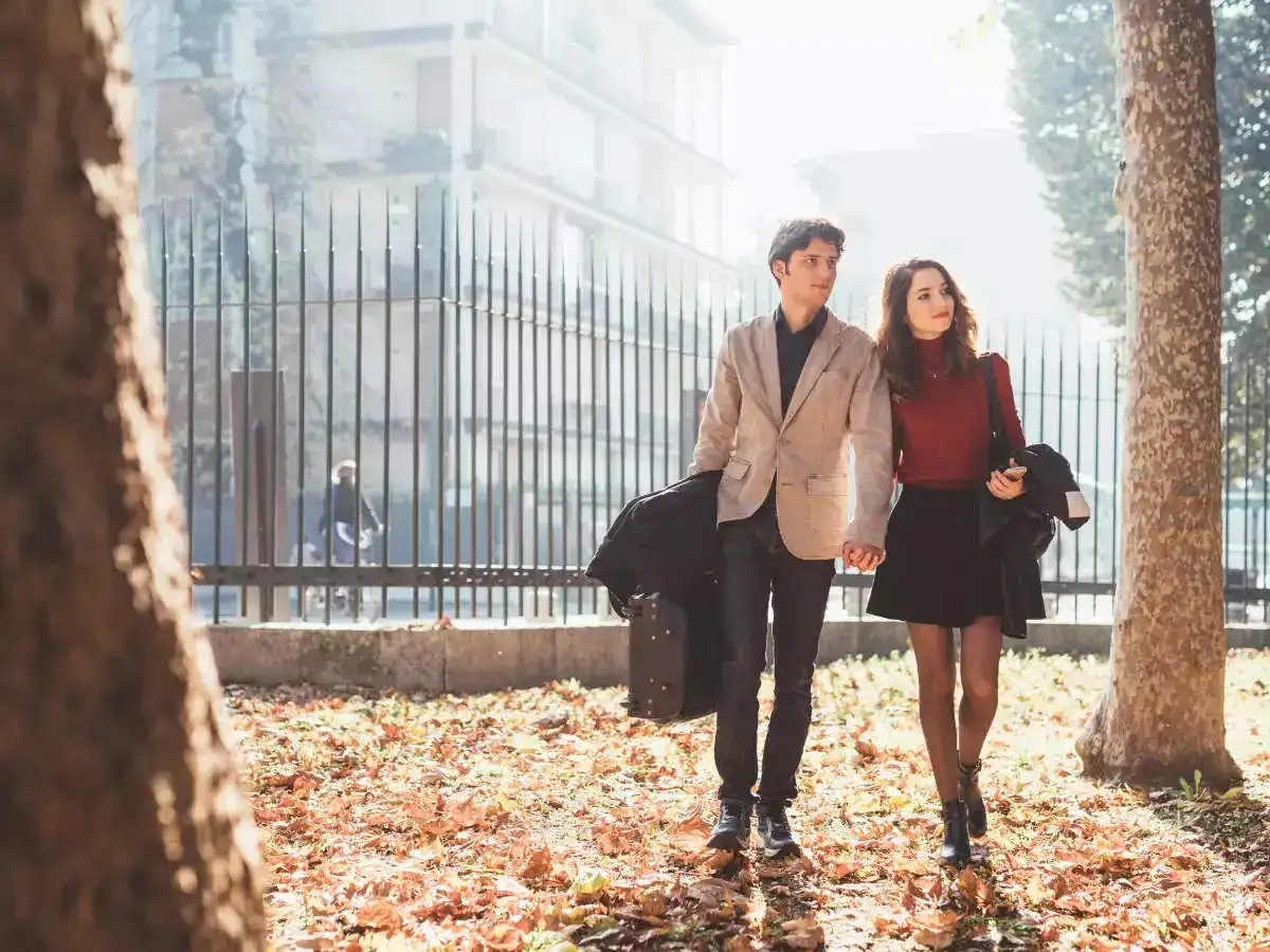 A boy and a girl walking