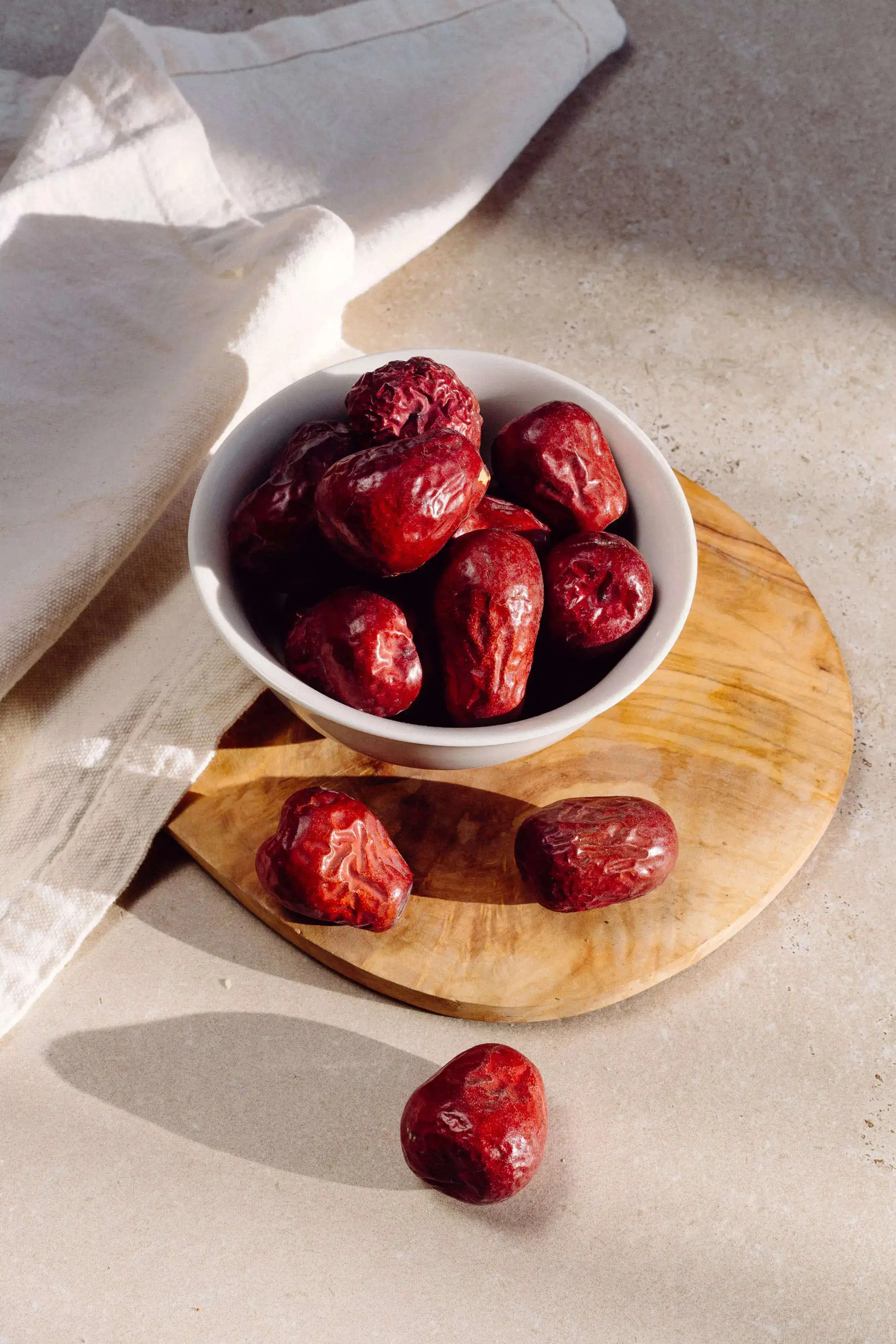 Dates in a white ceramic bowl