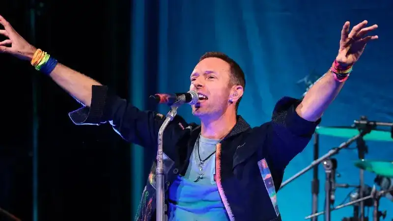 Coldplay’s Chris Martin takes a tumble on stage during Melbourne concert