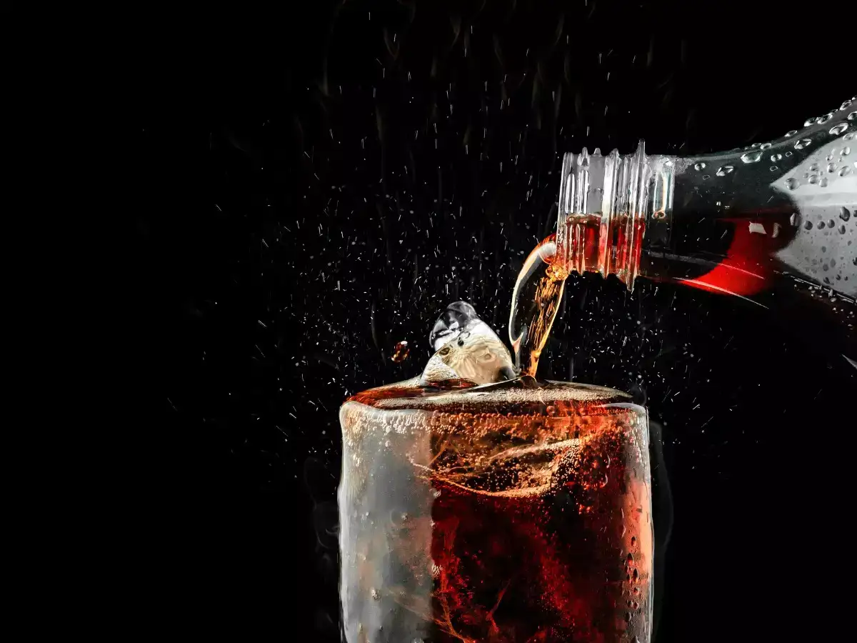 Soft drink being poured in a glass