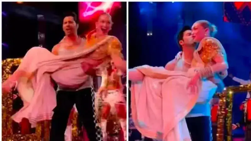 Gigi Hadid reacts to Varun Dhawan lifting her up during his dance performance