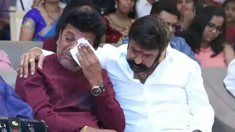 Shiva Rajkumar cries after watching Puneeth Rajkumar's video at an event, Balakrishna consoles him