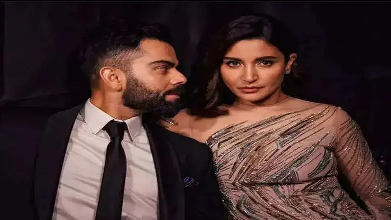 Virat Kohli gives husband goals as he handles Anushka Sharma's dress