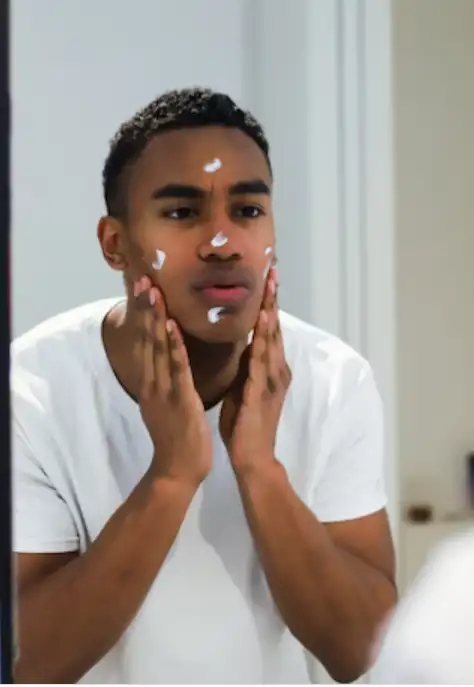 Man using retinol product