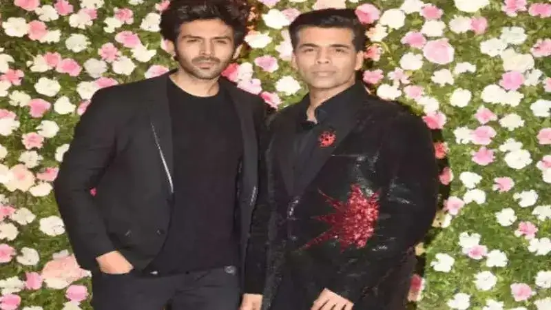 Kartik Aaryan and Karan Johar resolved their issues? Picture of them hugging goes viral