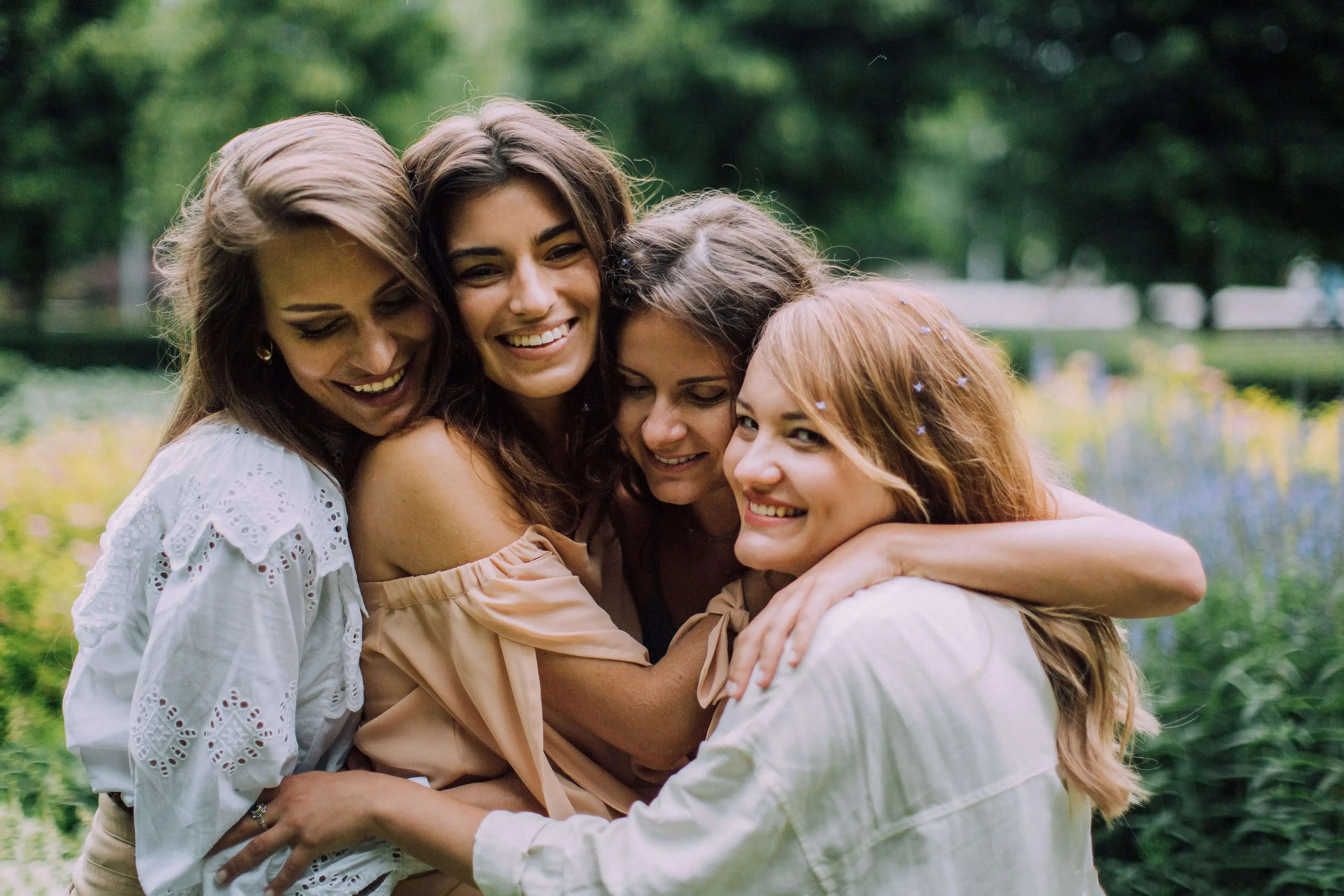 A group of friends hugging each other