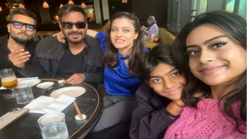 Ajay Devgn shares a family photo with Kajol, Nysa and Yug as they enjoy a meal together