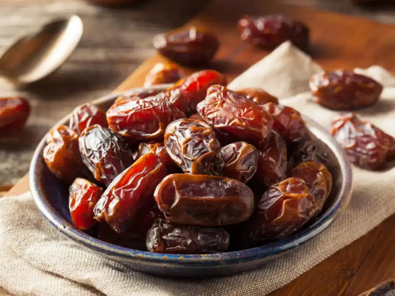 Dates kept in a metal bowl