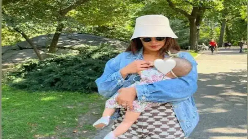 Priyanka Chopra shares a pic as she 'walks in the park’ holding daughter Malti really close to her