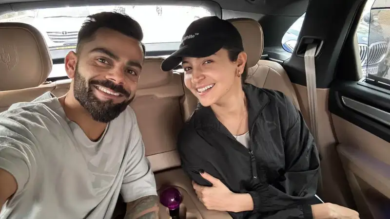 Anushka Sharma, Virat Kohli enjoy Delhi rain, take a ride around the city. See pic