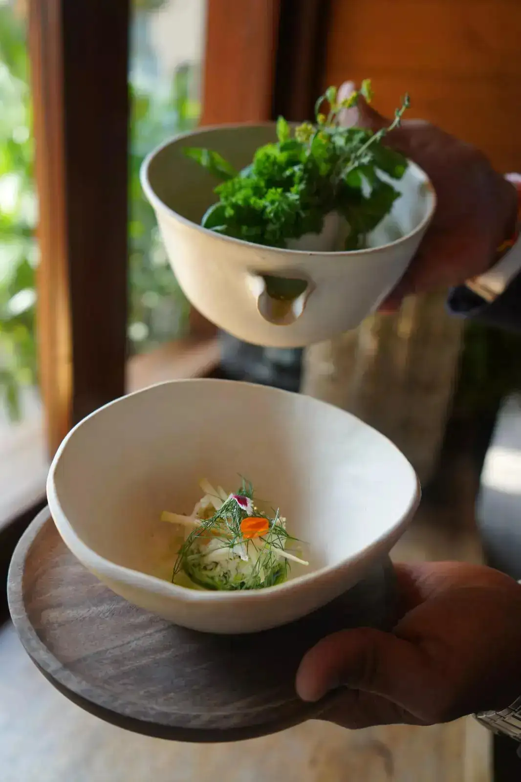 Seasoned crab meat in a green apple and cucumber broth