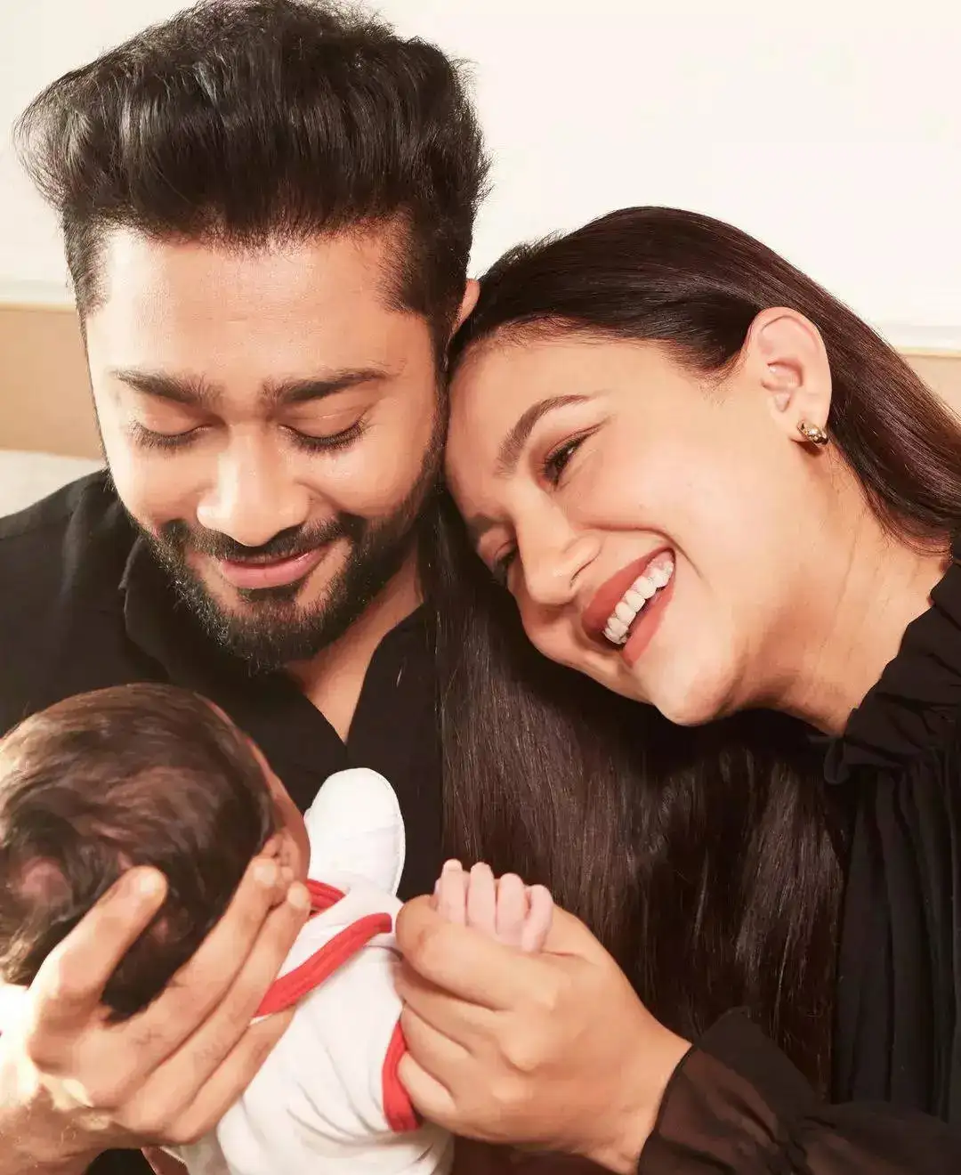 Gauahar Khan with husband and baby