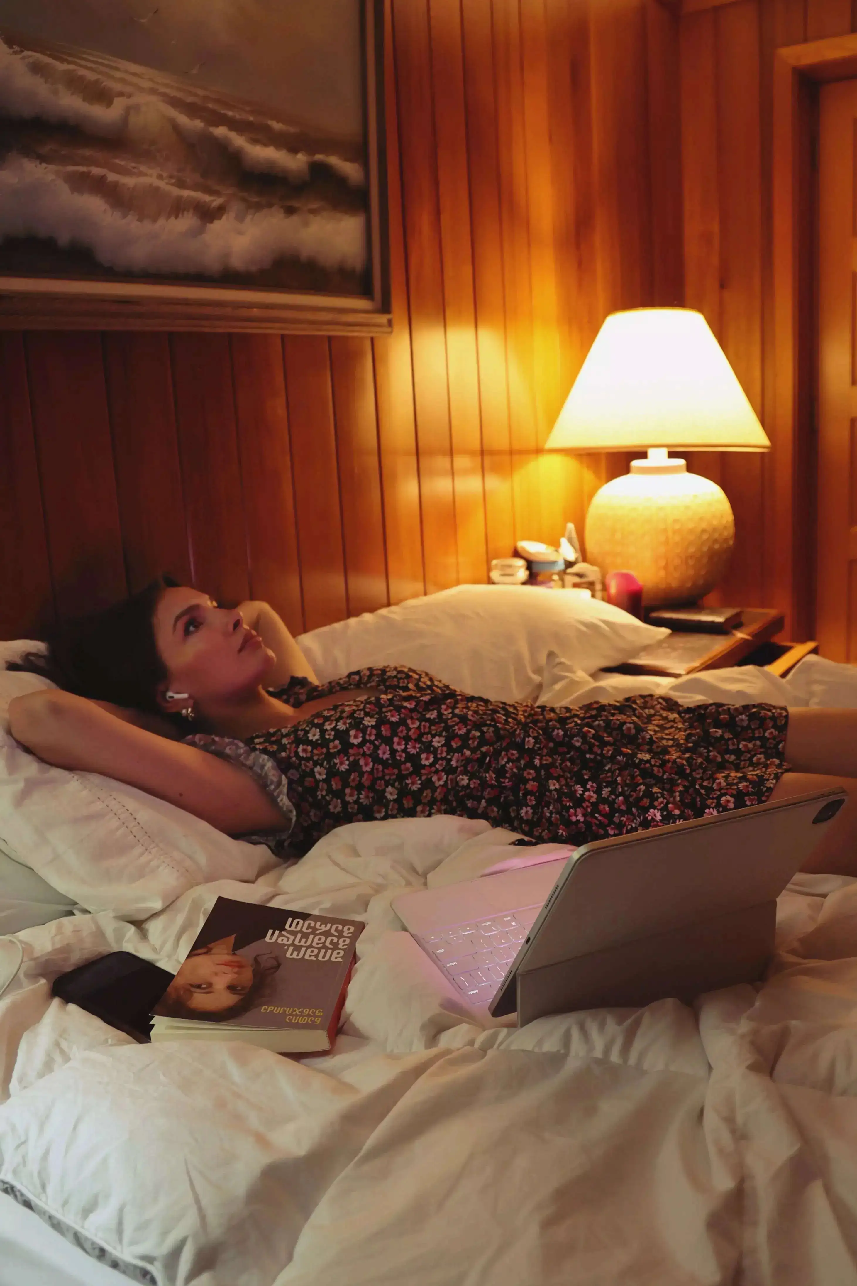 A woman lying on the bed and thinking