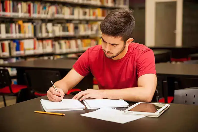 studying-student-on-desk