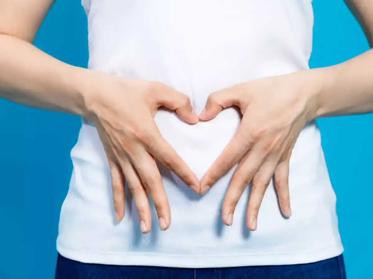 A girl holding her stomach