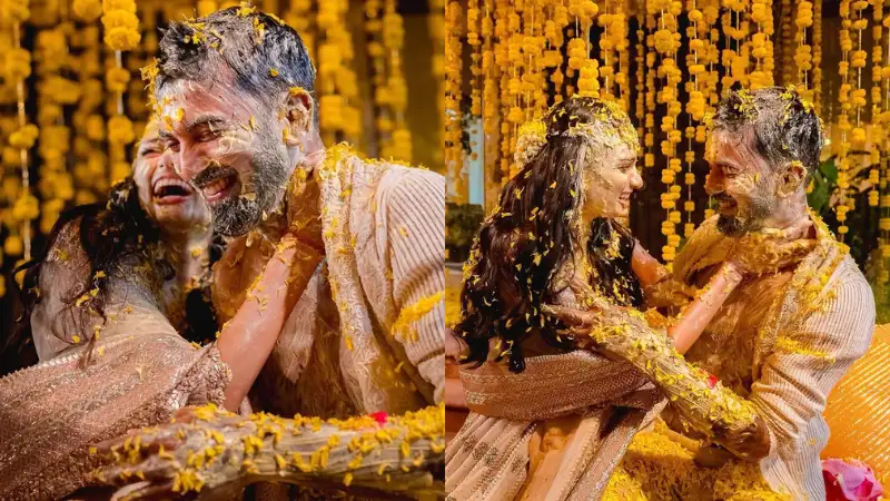 In the first photos from the haldi ceremony, Athiya Shetty is seen holding KL Rahul close